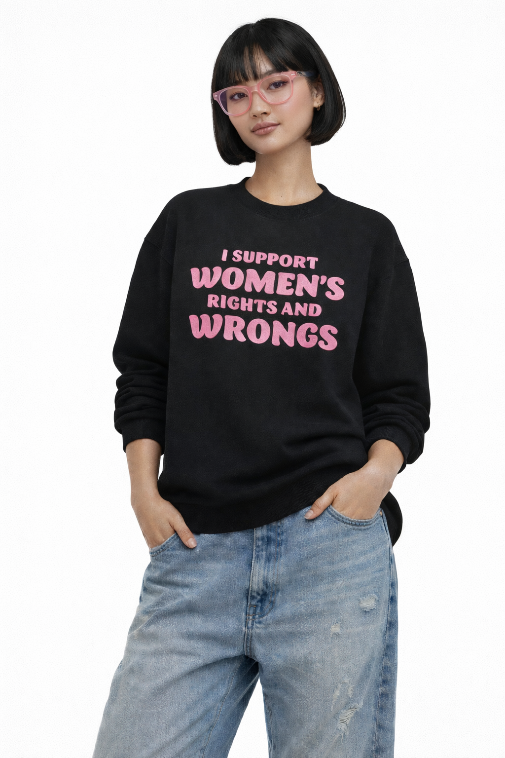 Person wearing a black sweatshirt with pink text on a white background