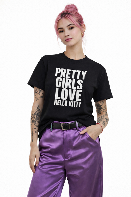 Person wearing a black t-shirt with 'Pretty Girls Love Hello Kitty' text, standing against a white background.